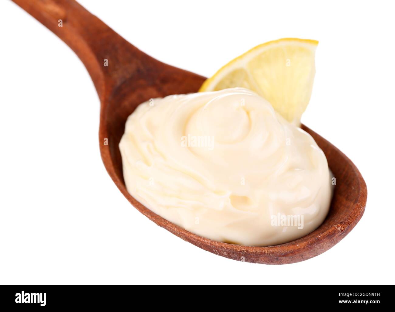 Mayonnaise in wooden spoon isolated on white Stock Photo Alamy