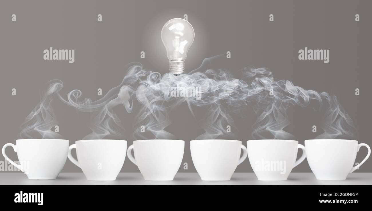 Idea birth. Business communication and creativity. Group of coffee cups with bulb on cloud of steam. Group training, brainstorming, business coaching Stock Photo