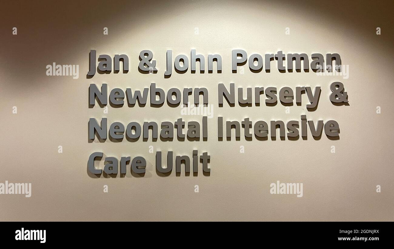 Atlanta, GA USA - March 26, 2021:  A sign in a hallway the says Jan and John Portman Newborn Nursery and Neonatal Intensive Care Unit at Piedmont Hosp Stock Photo