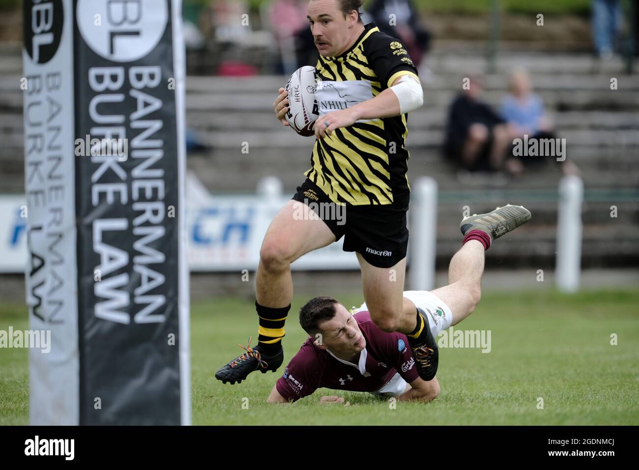 Hawick, UK. 14th Aug, 2021. Action from the Hawick 7s on Saturday 14 August 2021 at Mansfield, Hawick. Iain Chisholm (Melrose Rugby) with ball in hand heads for a try in the early pool match against Gala RFC Credit: Rob Gray/Alamy Live News Stock Photo