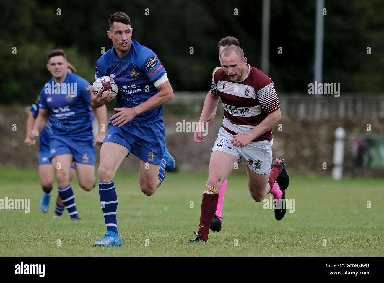 Hawick, UK. 14th Aug, 2021. Action from the Hawick 7s on Saturday 14 August 2021 at Mansfield, Hawick. Lewis Young (JedForest RFC) with ball runs for another try in the 46-0 defeat of Watsonians in the pool matches. Credit: Rob Gray/Alamy Live News Stock Photo