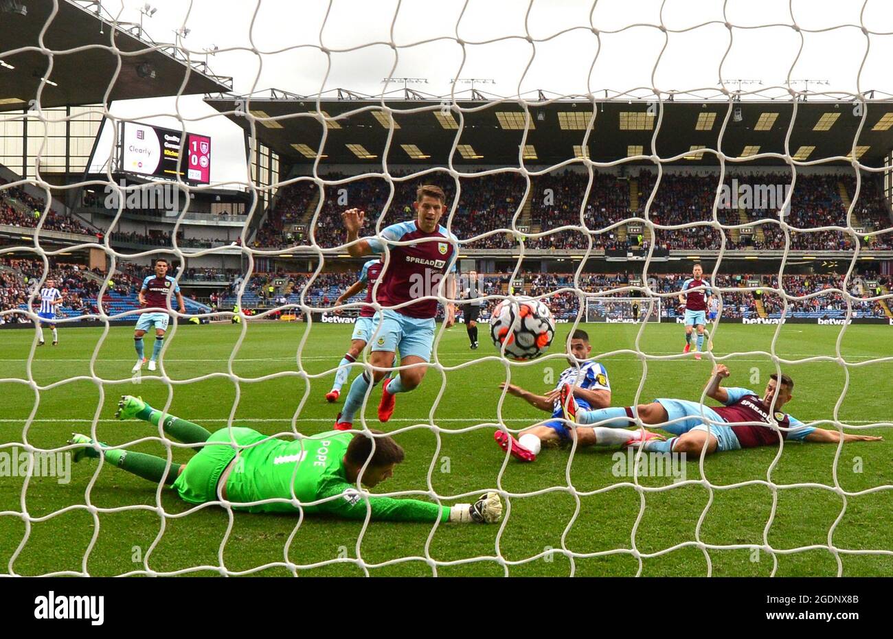 Brighton and Hove Albion's Neal Maupay scores their side's first goal of the game during the Premier League match at Turf Moor, Burnley. Picture date: Saturday August 14, 2021. Stock Photo