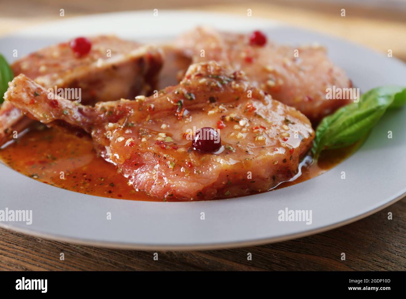 Preparing lamb chops Stock Photo - Alamy