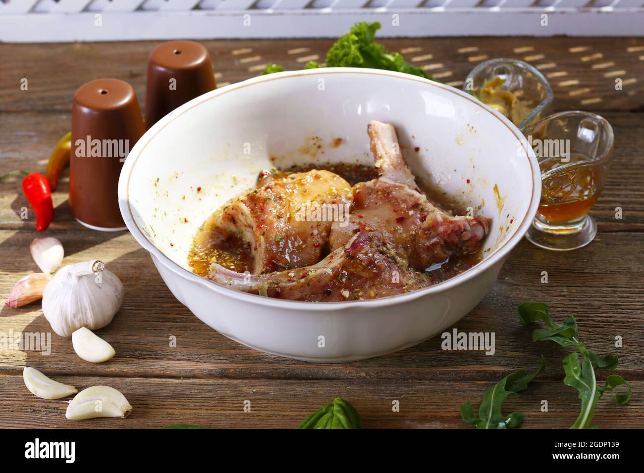 Preparing lamb chops Stock Photo - Alamy