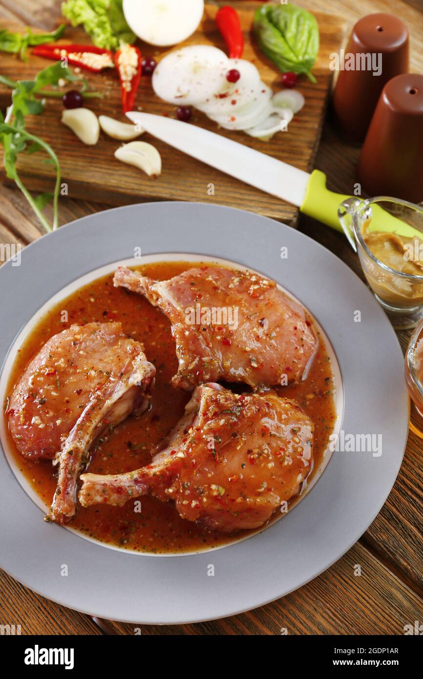 Preparing lamb chops Stock Photo - Alamy