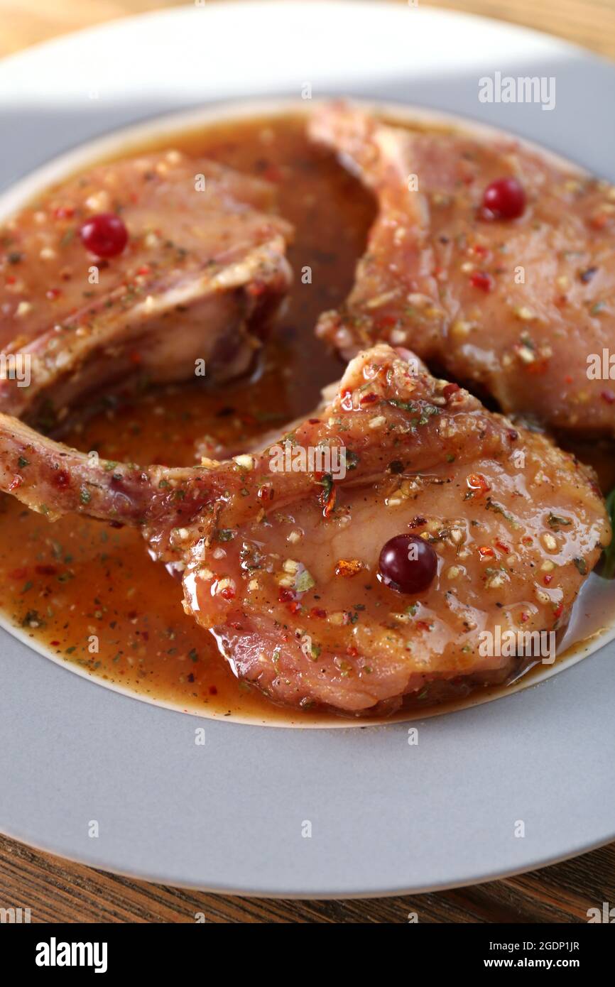 Preparing lamb chops Stock Photo - Alamy