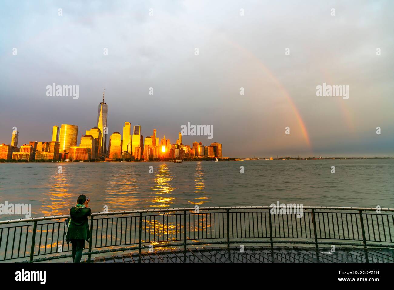 Rainbow appears over the Lower Manhattan skyscraper after the ...