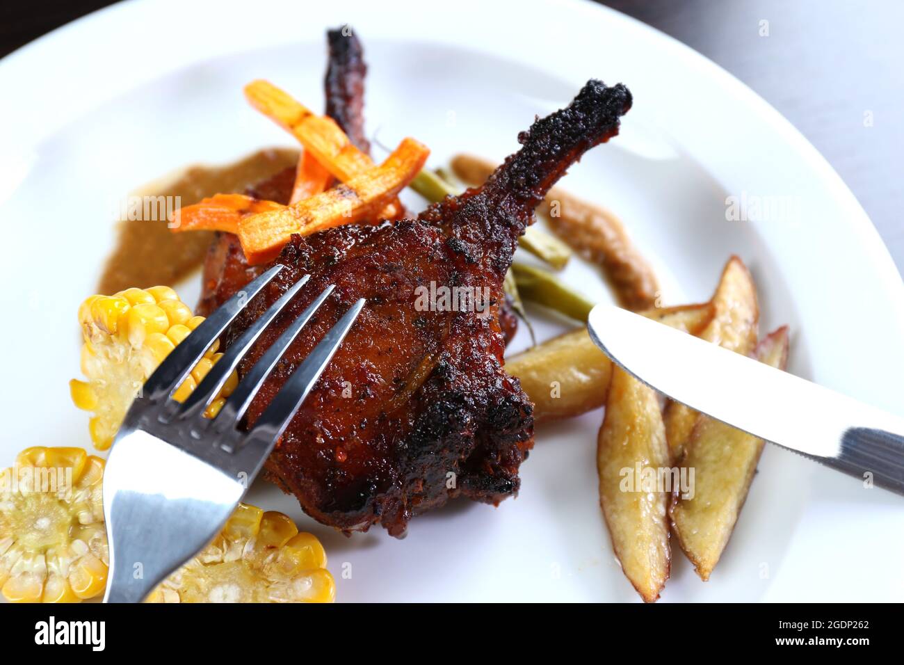Roasted lamb chops Stock Photo - Alamy