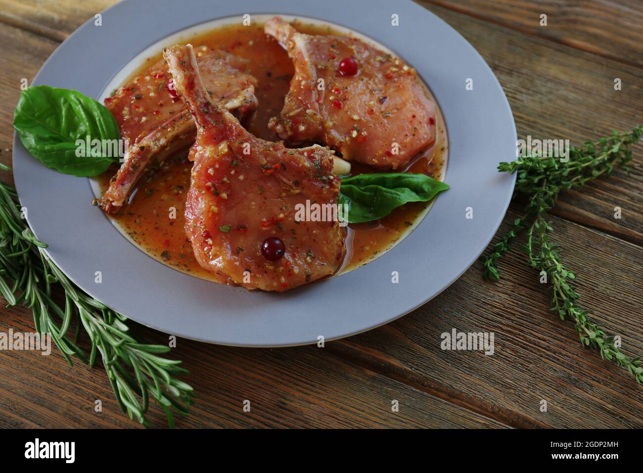 Preparing lamb chops Stock Photo - Alamy