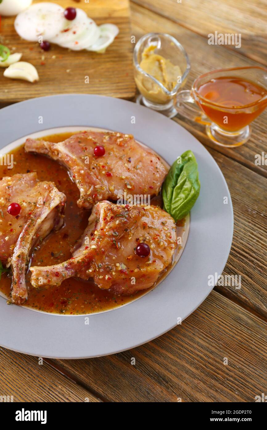 Preparing lamb chops Stock Photo - Alamy