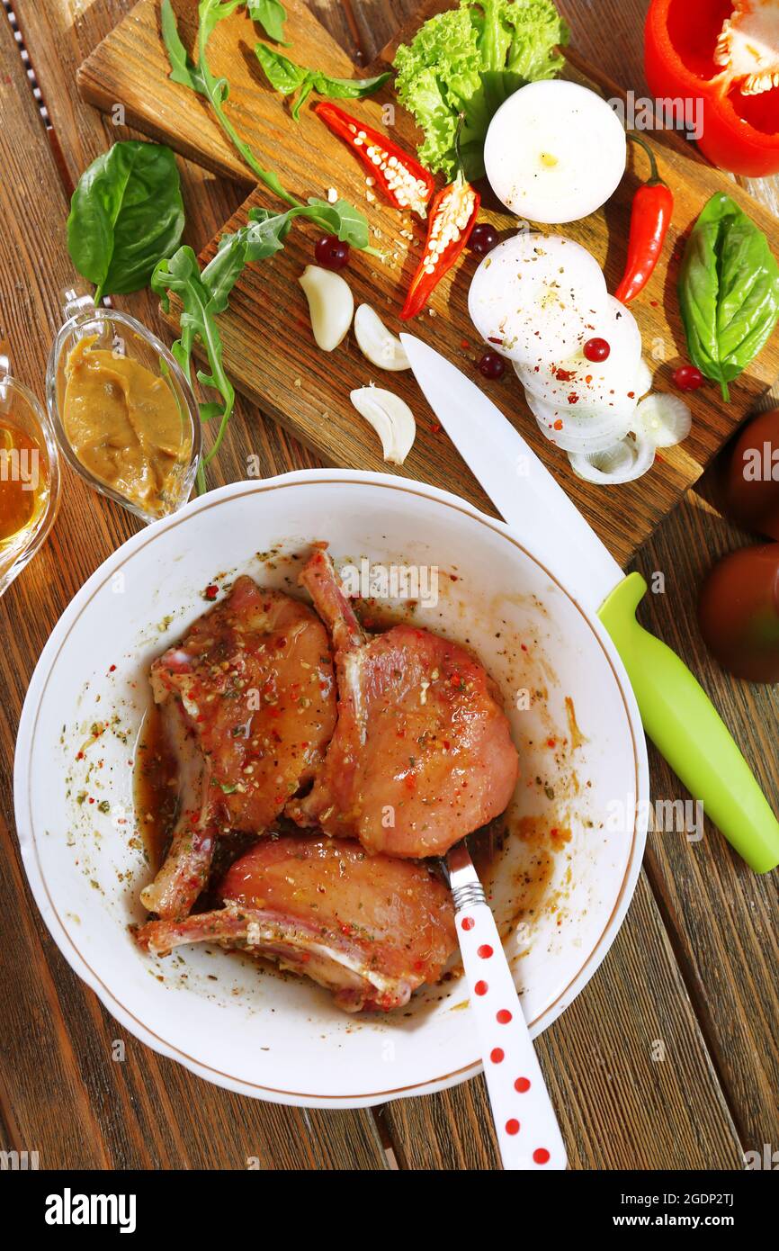 Preparing lamb chops Stock Photo - Alamy