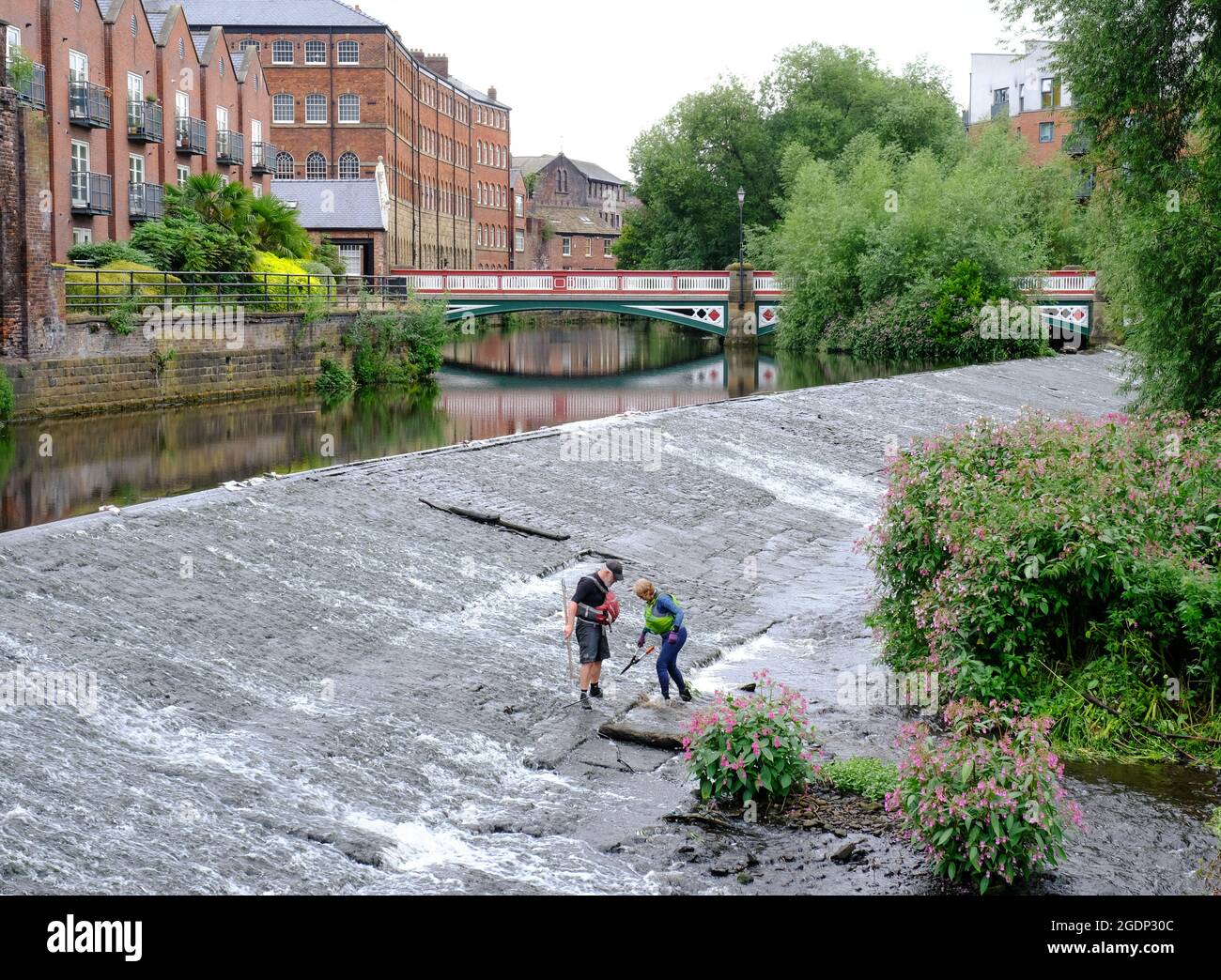 Litter pickers working in the weir by the Kelham Island museum
