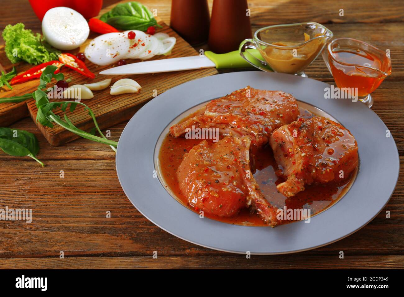 Preparing lamb chops Stock Photo - Alamy