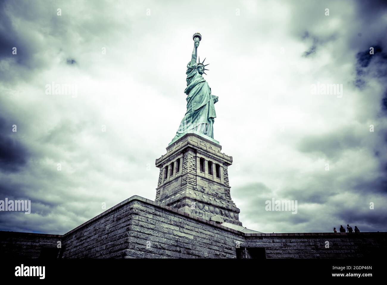 Walking around the Statue of liberty Stock Photo
