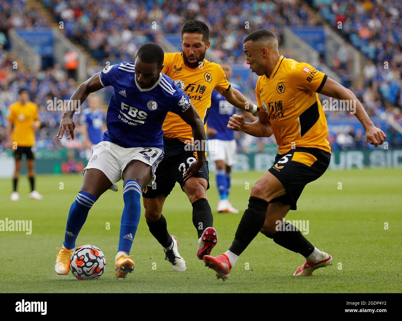 Leicester, England, 14th August 2021.  Marcal and Joao Moutinho of Wolverhampton Wanderers challenge Ricardo Pereira of Leicester City during the Premier League match at the King Power Stadium, Leicester. Picture credit should read: Darren Staples / Sportimage Stock Photo