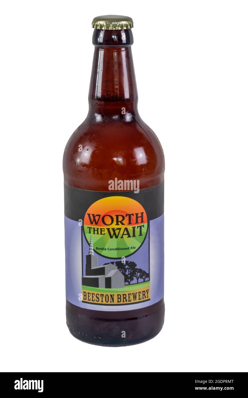 A bottle of Worth The Wait bottle-conditioned ale from the Beeston Brewery in Norfolk.  It has an ABV of 4.2%. Stock Photo