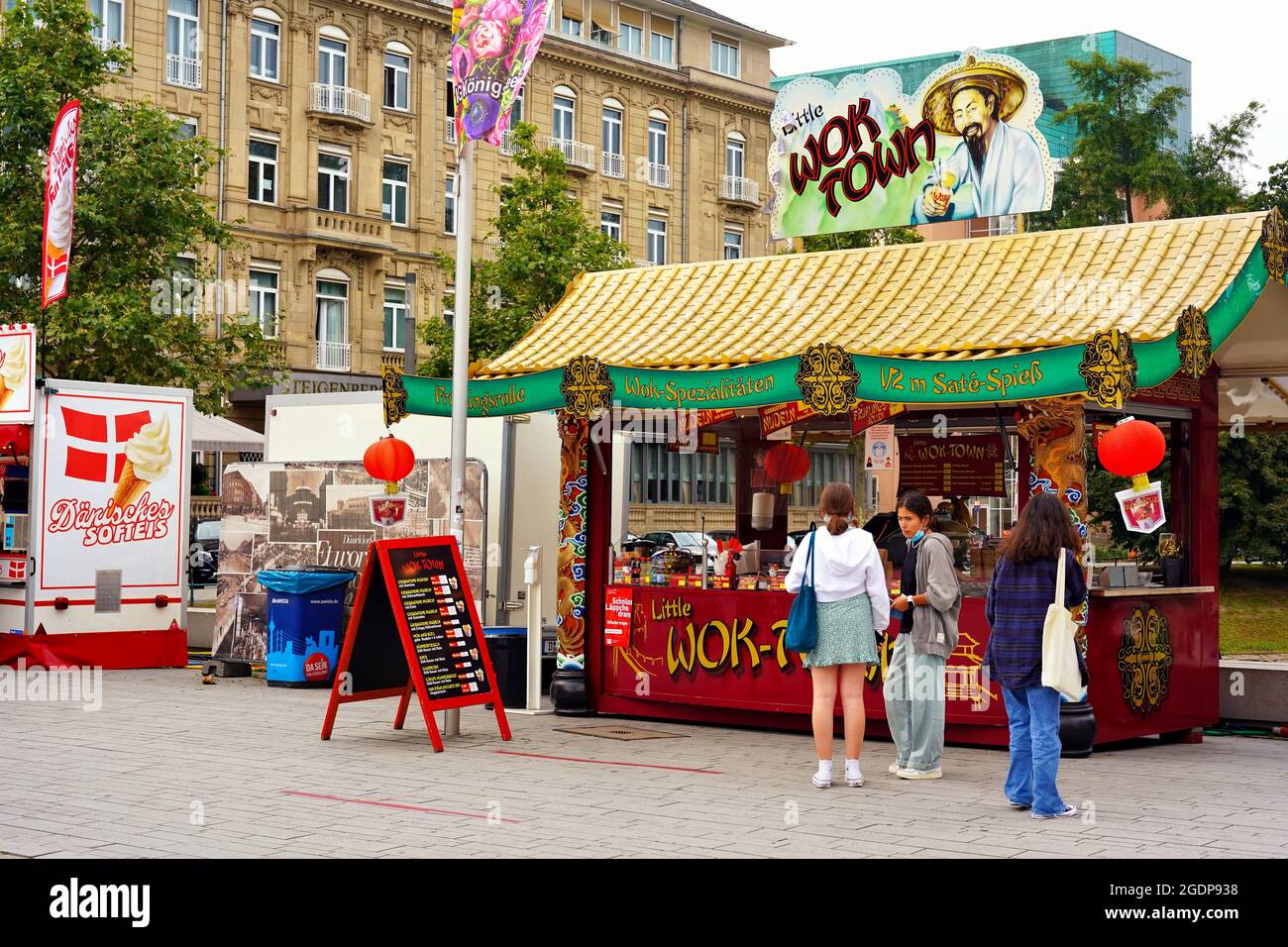 Corneliusplatz in downtown Düsseldorf, Germany, with various street food stands. Stock Photo