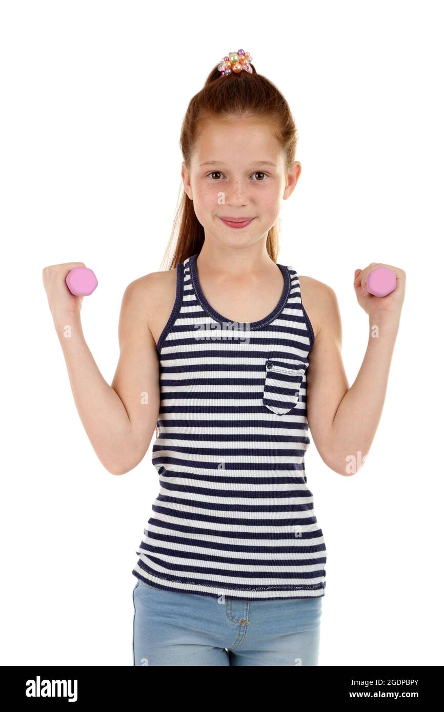 Beautiful little girl doing exercises isolated on white Stock Photo - Alamy