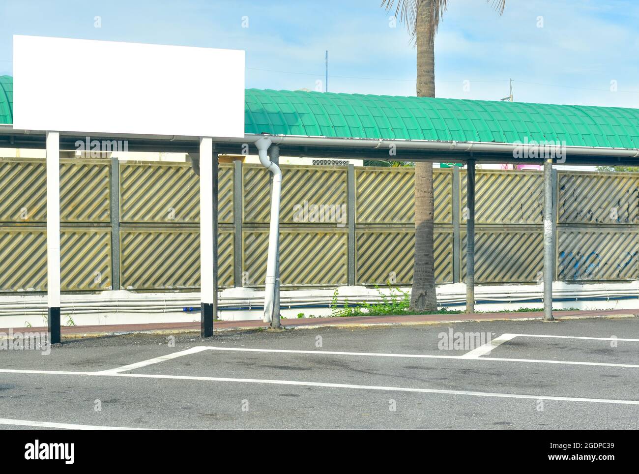 Blank White rectangular mockup billboard at the public parking Stock Photo