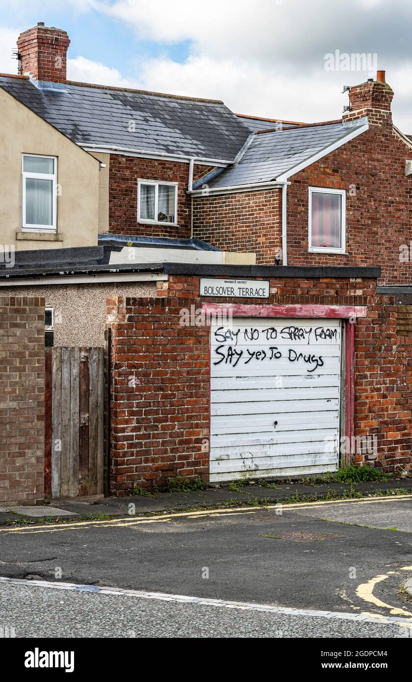 Grafitti on a garage door in Ashington, Northumberland in the north of England Stock Photo