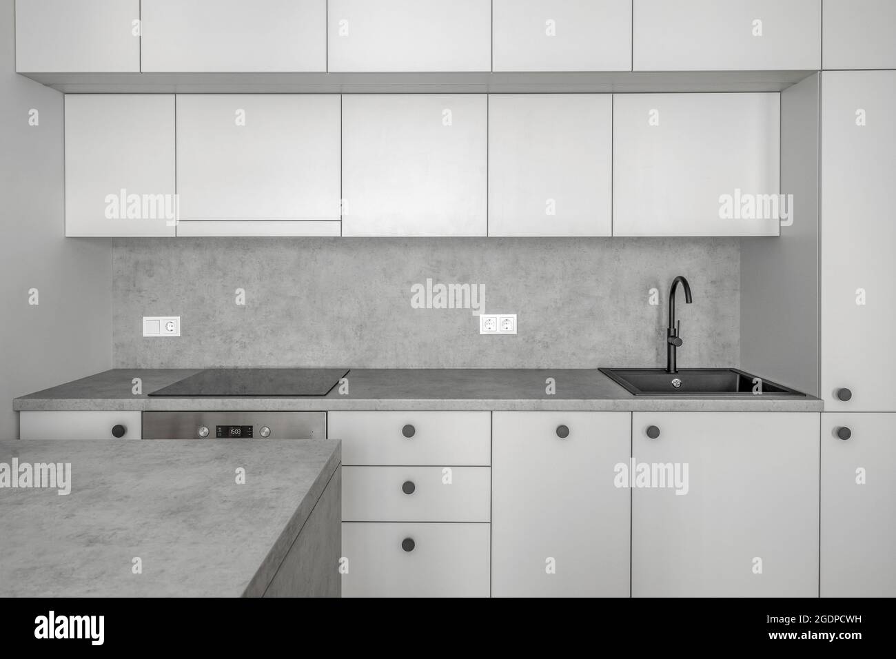 Minimalist aesthetic light grey kitchen interior design on one tone