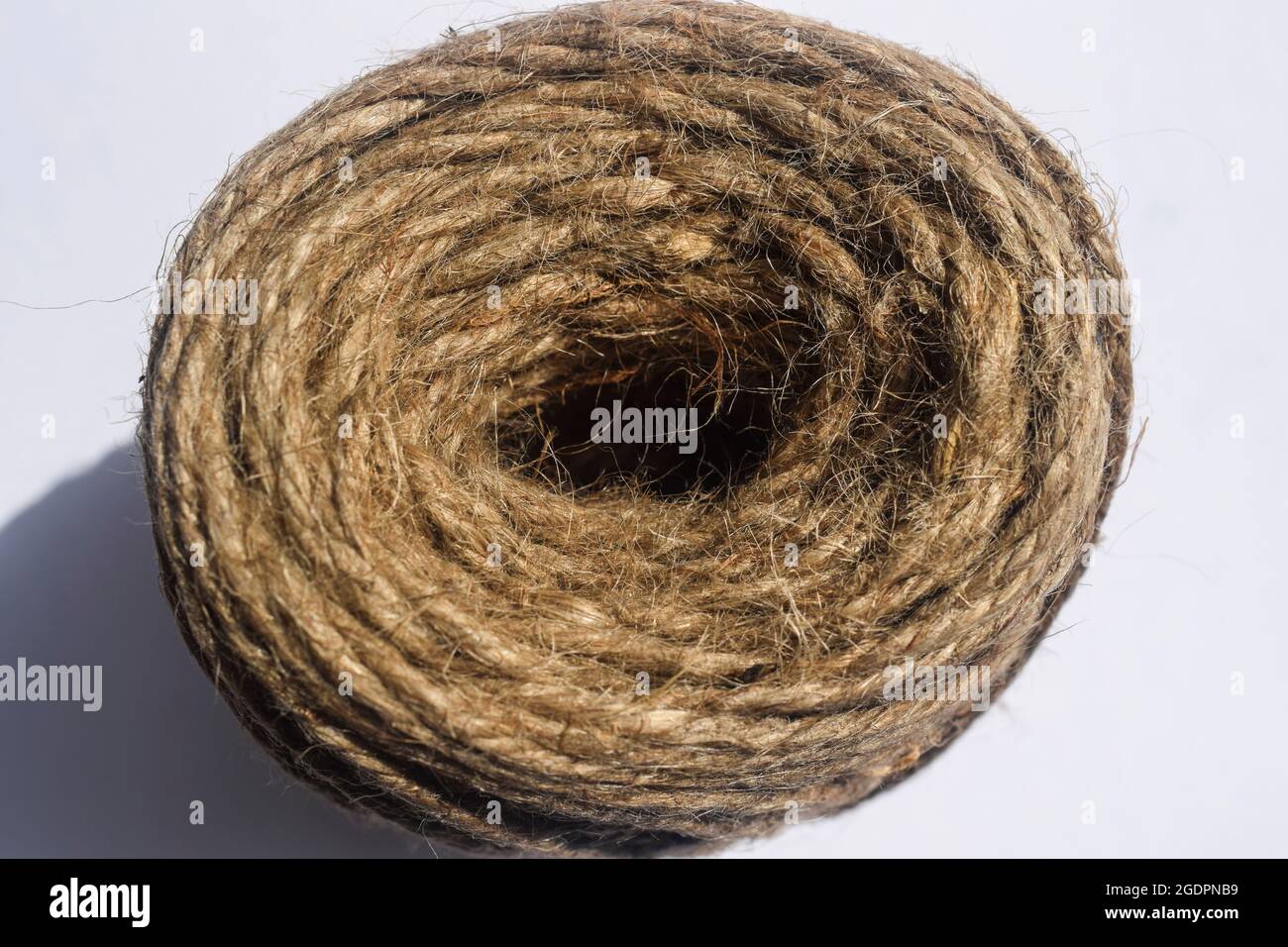 Jute rope twine bundle roll background. thread jutes pattern wrapped in