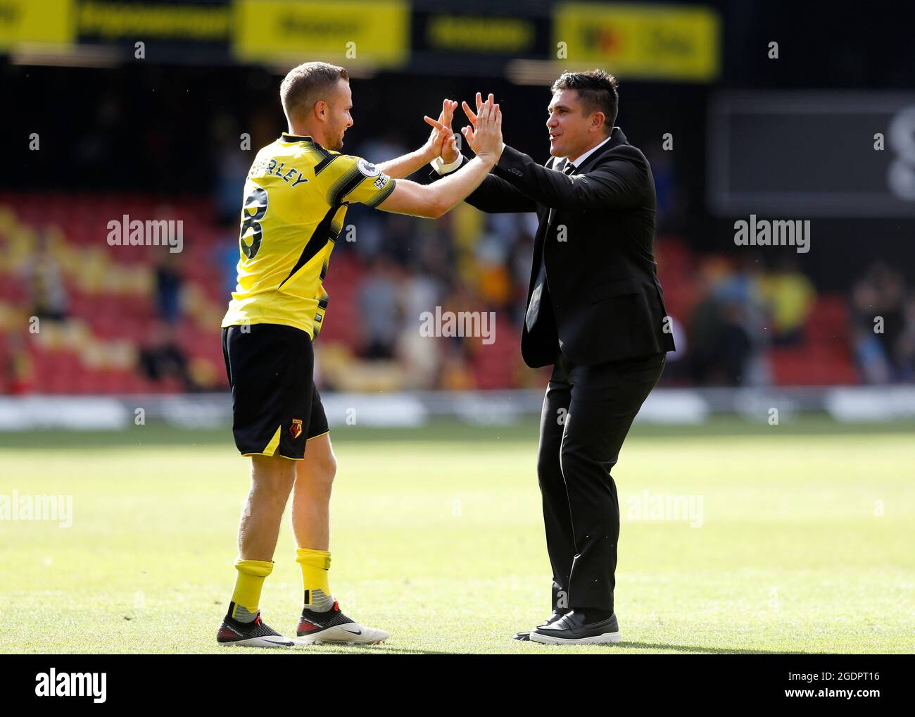 14th August 2021; Vicarage Road Stadium, Watford, Herts, England; Premier League football, Watford versus Aston Villa; Watford Manager Xisco Munoz celebrates with Tom Cleverley of Watford Stock Photo