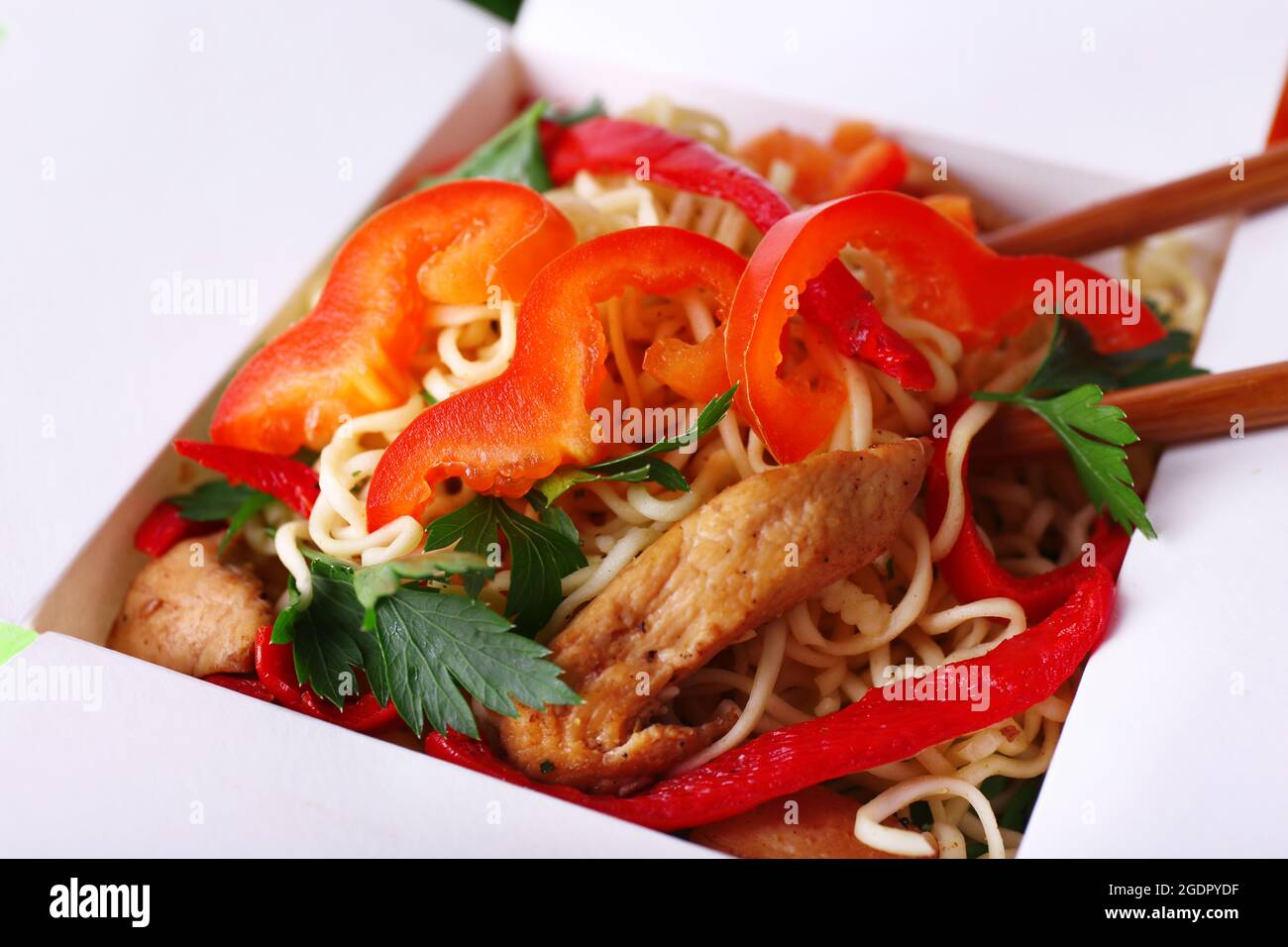 Chinese noodles in takeaway box closeup Stock Photo Alamy