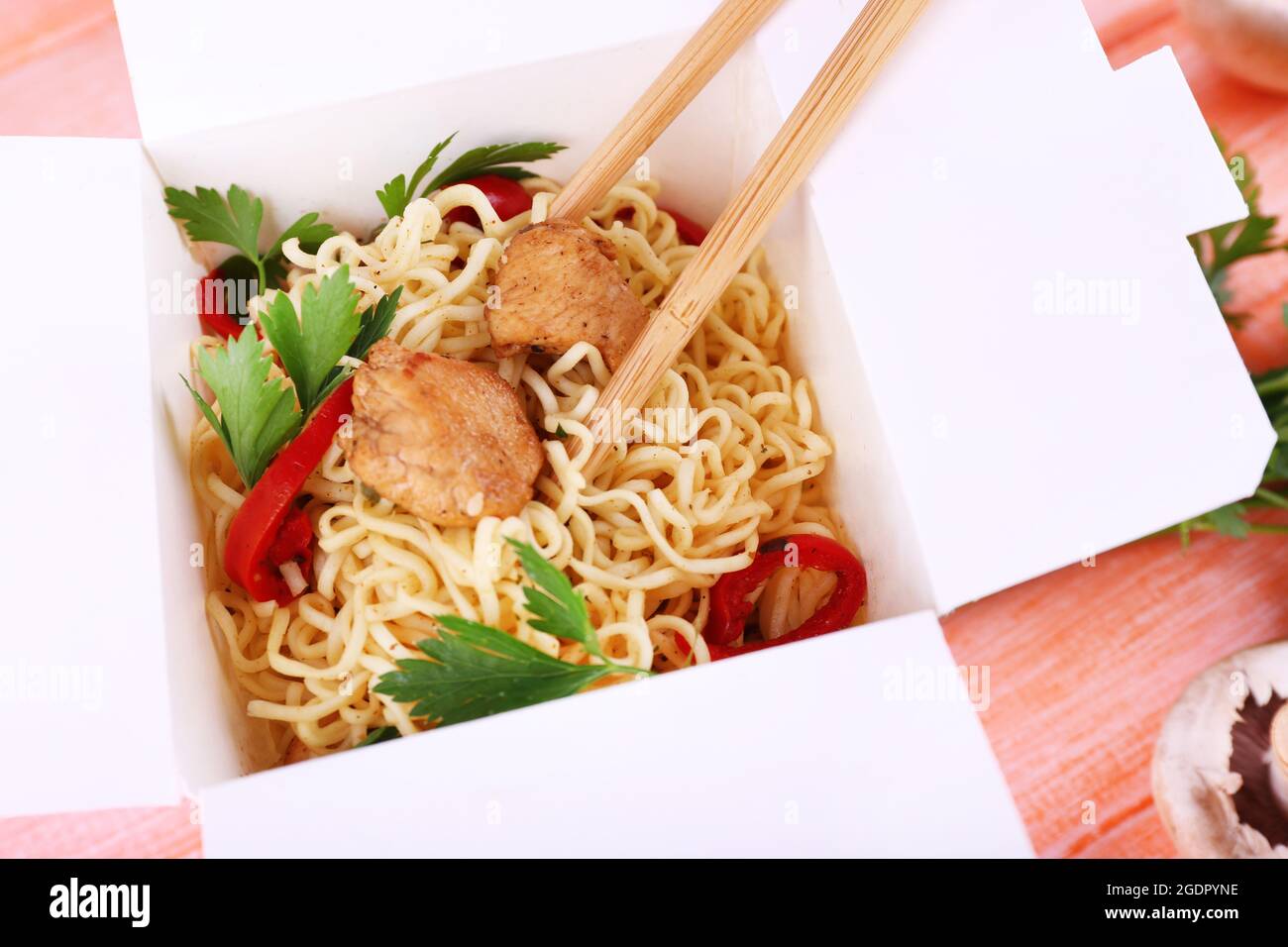 Chinese noodles in takeaway box closeup Stock Photo Alamy