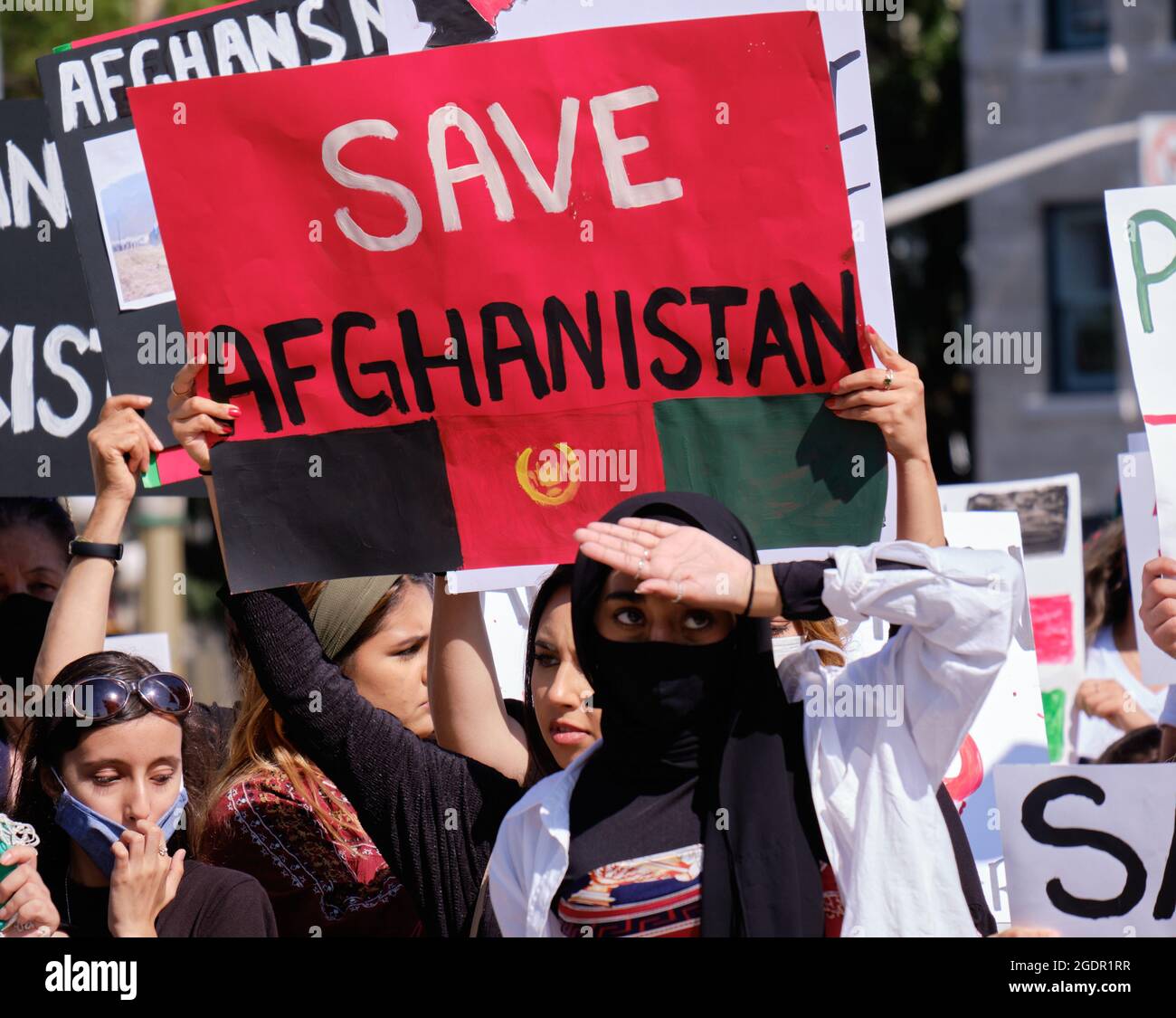 Ottawa, Canada. August 14th, 2021. Member of the Afghani diaspora gathered at the Peacekeeping Monument to protest the ongoing war in Afghanistan as the Taliban continue to take control of the country. They condemn the West's lack of action in ensuring peace in the region. Credit: meanderingemu/Alamy Live News Stock Photo