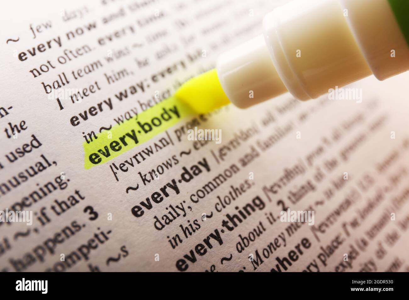 Yellow marker highlighting word in dictionary Stock Photo Alamy