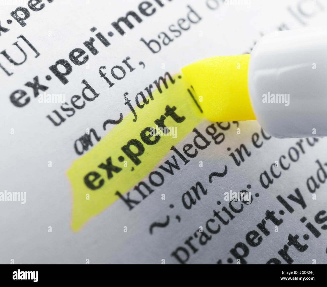 Yellow marker highlighting word in dictionary Stock Photo Alamy