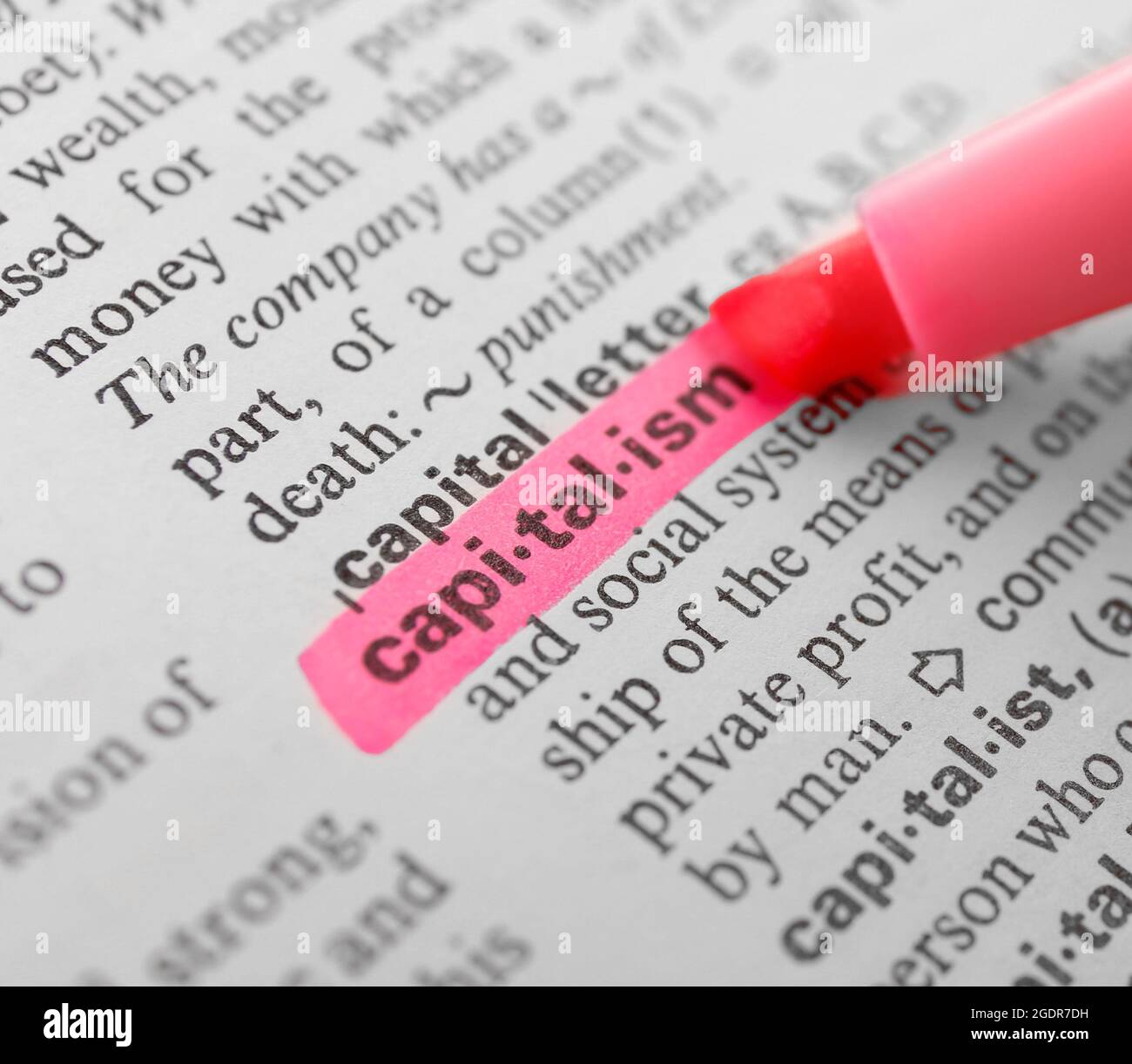 Pink marker highlighting word in dictionary Stock Photo Alamy