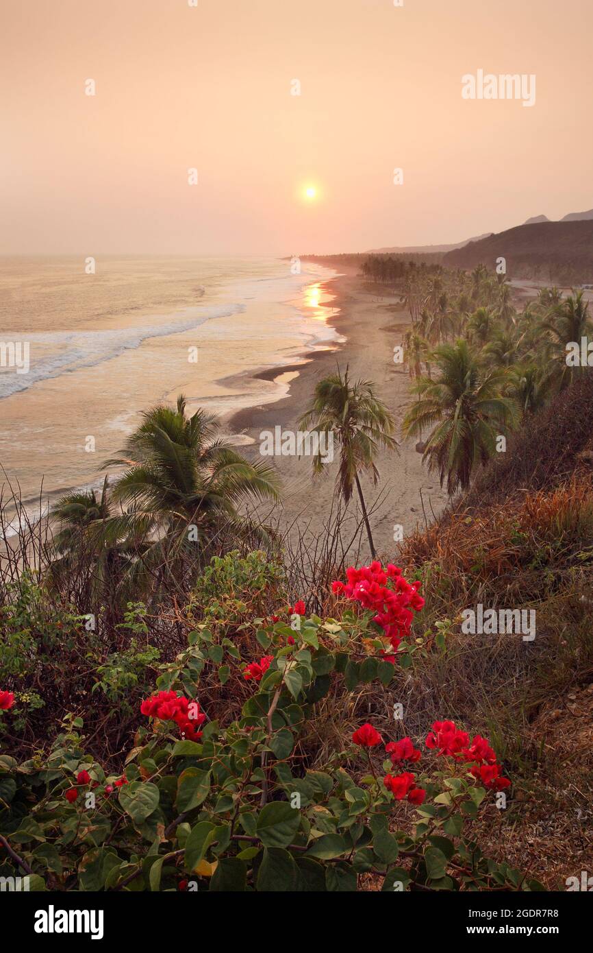 Sunset over the Pacific at Caleta Beach, Michoacan, Mexico. Stock Photo