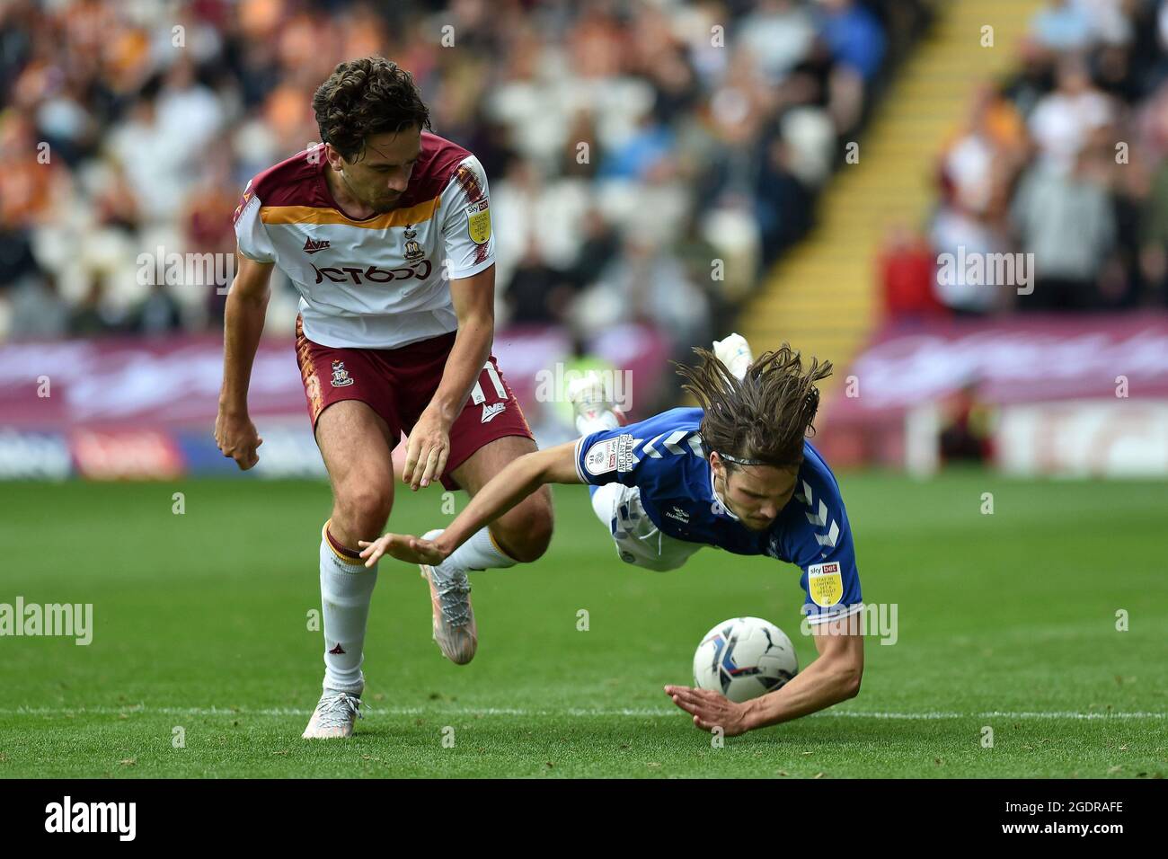 BRADFORD, UK. AUGUST 14TH Oldham Athletic's Samuel Hart tussles with Alex Gilliead of Bradford City during the Sky Bet League 2 match between Bradford City and Oldham Athletic at the Coral Windows Stadium, Bradford on Saturday 14th August 2021. (Credit: Eddie Garvey | MI News) Credit: MI News & Sport /Alamy Live News Stock Photo