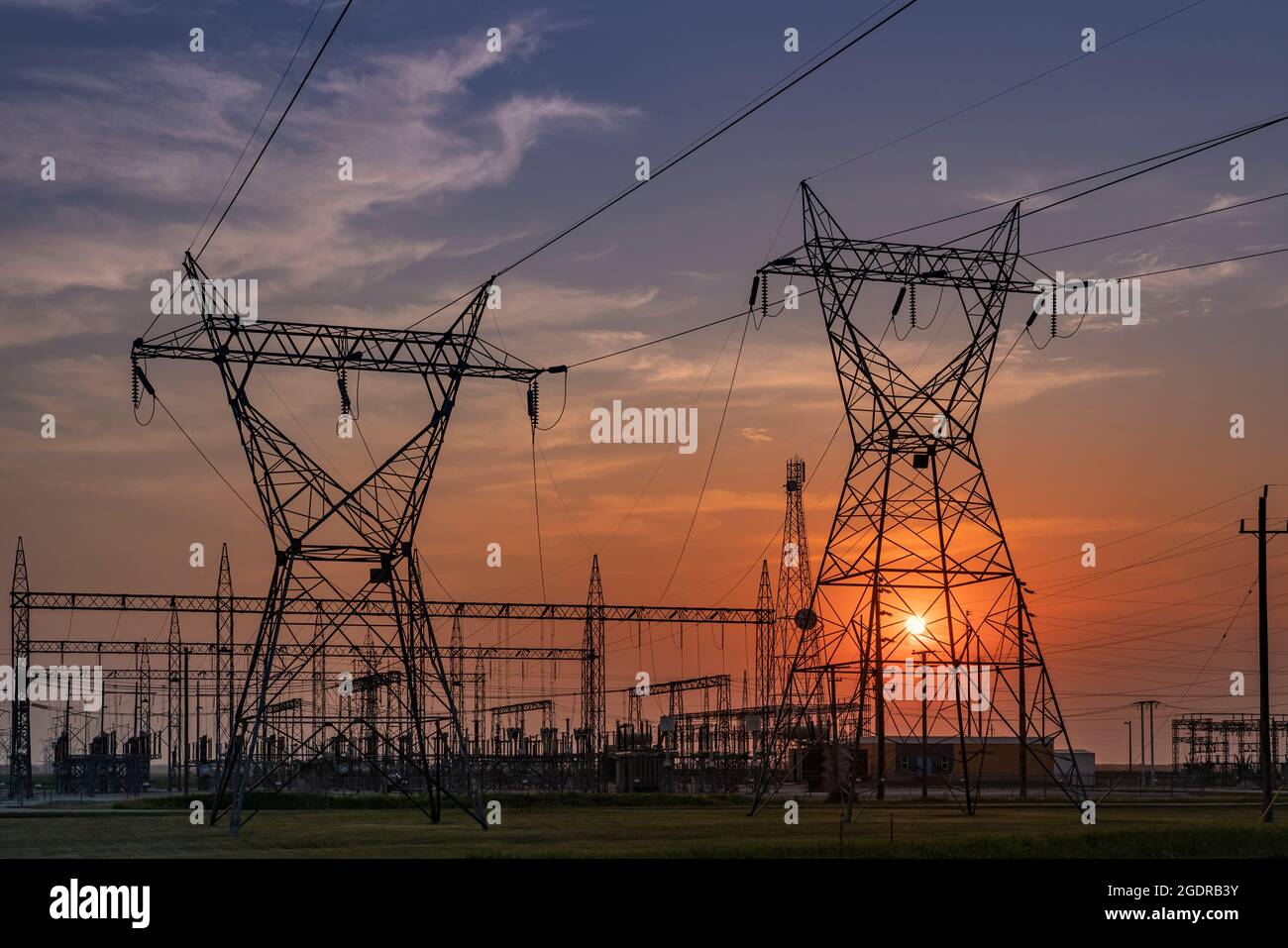 Transmission towers and power lines at sunset near Dauphin, Manitoba, Canada Stock Photo Alamy