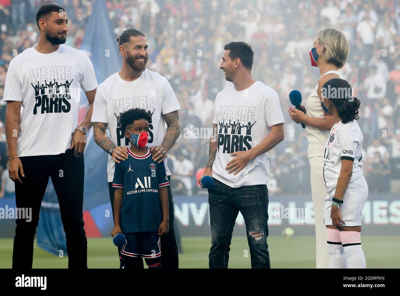 Goalkeeper of PSG Gianluigi Donnarumma, Sergio Ramos, Lionel Messi,  presenter Anne-Laure Bonnet during the new recruits of PSG presentation  ahead of the French championship Ligue 1 football match between Paris  Saint-Germain and