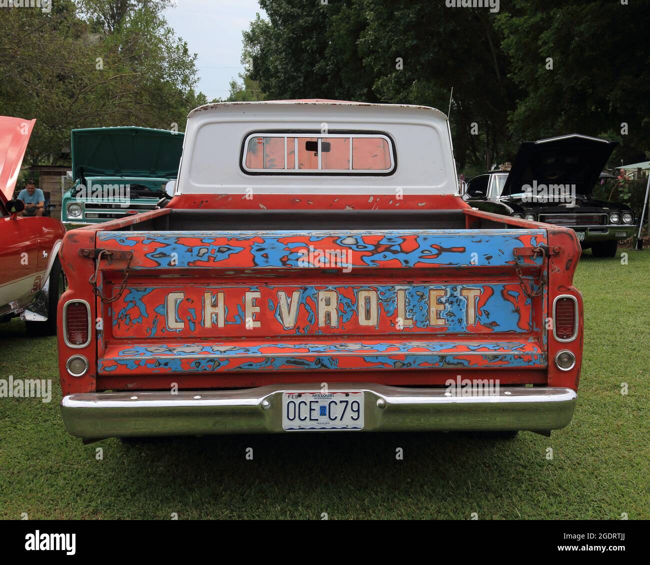 Classic car show at a restored Sinclair station on Old Route 66, Ash