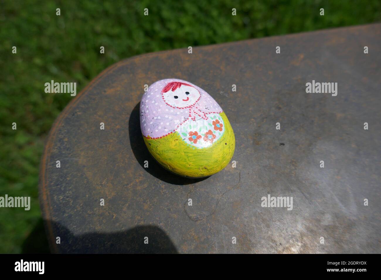 Kindness rock with Russian nesting doll painted on Stock Photo