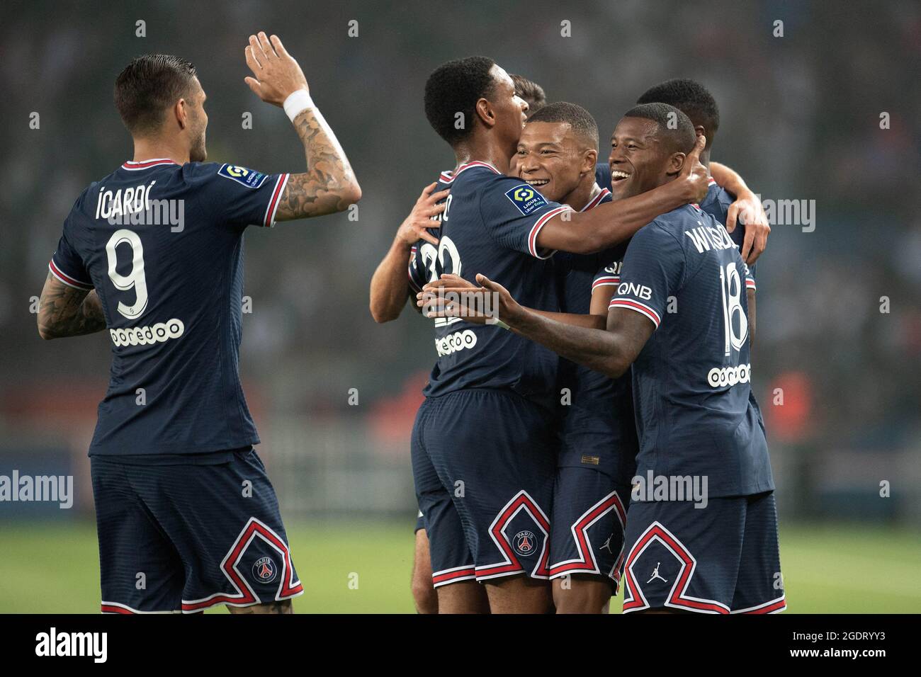 Kylian Mbappe of Paris Saint-Germain celebrates his goal with teammates ...