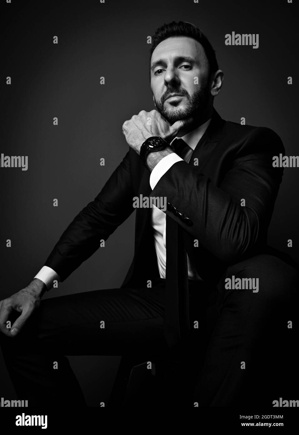 Man sitting in office Black and White Stock Photos & Images - Alamy