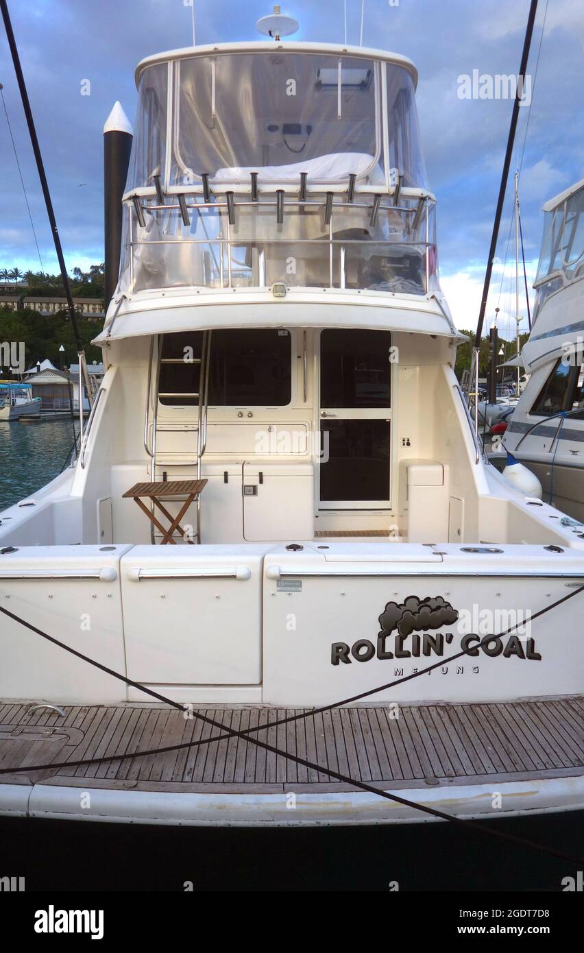Motor cruiser named “Rollin’ Coal” from Metung, Hamilton Island marina, Whitsunday region, Queensland, Australia. No PR Stock Photo