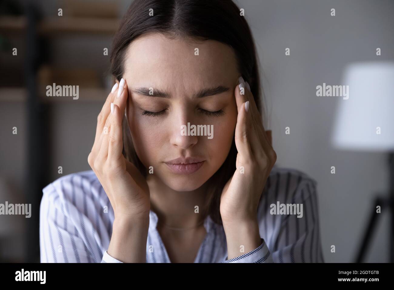 Sick Caucasian woman close eyes suffer from headache Stock Photo Alamy