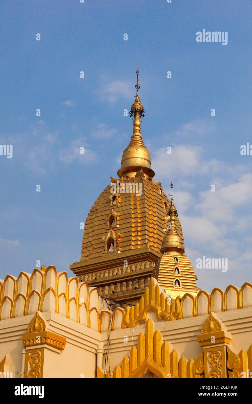 Golden building botathung pagoda yangon. Located in the downtown area of Yangon this complex was completely destroyed in bombing in WW2 Stock Photo