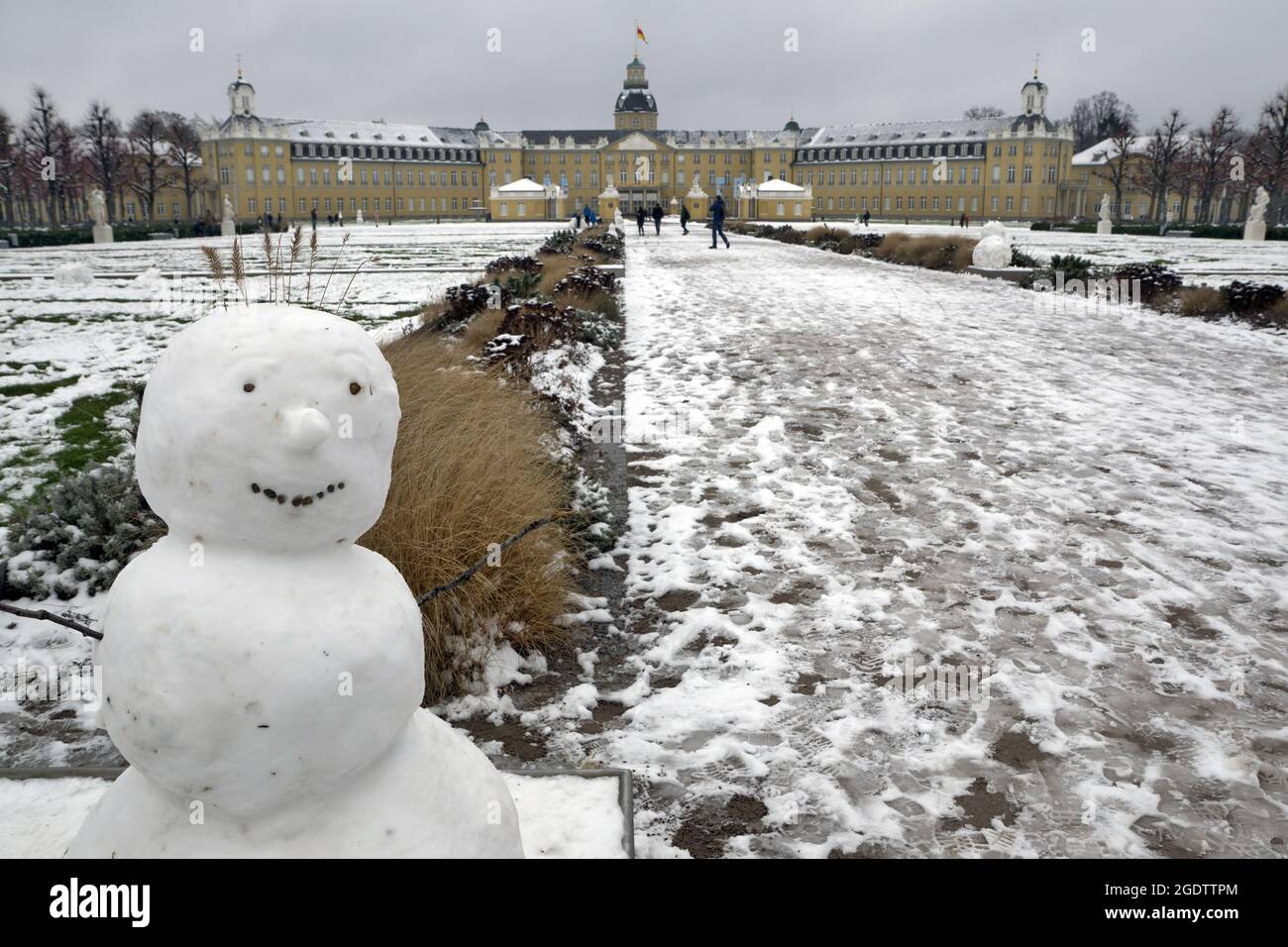 Karlsruhe, Germany: Castle in winter with snowman Stock Photo