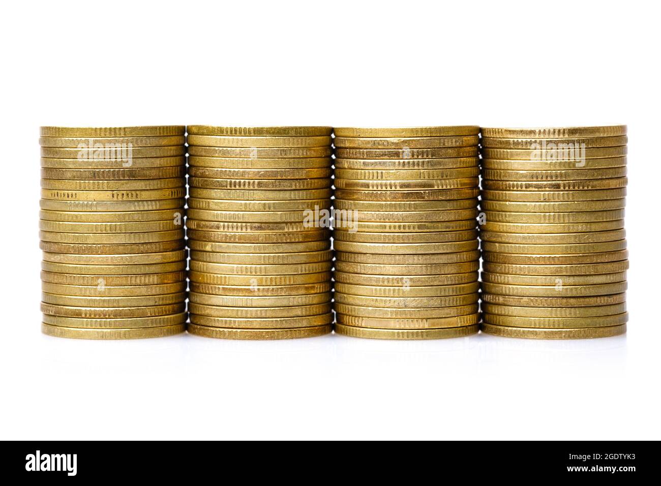 old & used golden coins stack up in white background Stock Photo