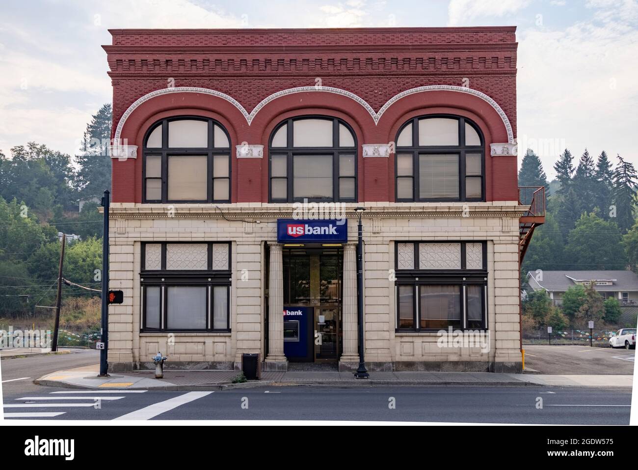 US bank branch in reused store next to empty parking lot, Colfax, Washington State, USA Stock Photo