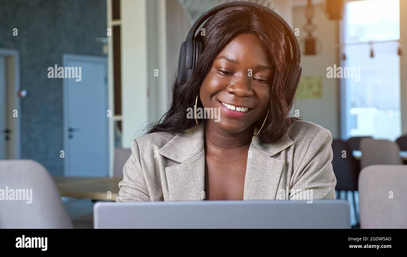Young black woman talks on hi-res stock photography and images - Alamy