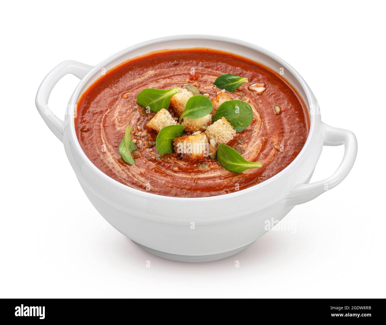 Bowl of tomato soup isolated on white background Stock Photo