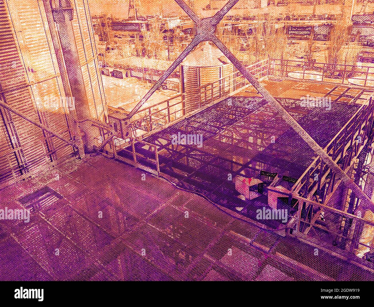 Modern grain terminal in the port. Industrial complex for loading, unloading, storage of grain cargo. Silos, conveyor belts, ventilation systems to cl Stock Photo